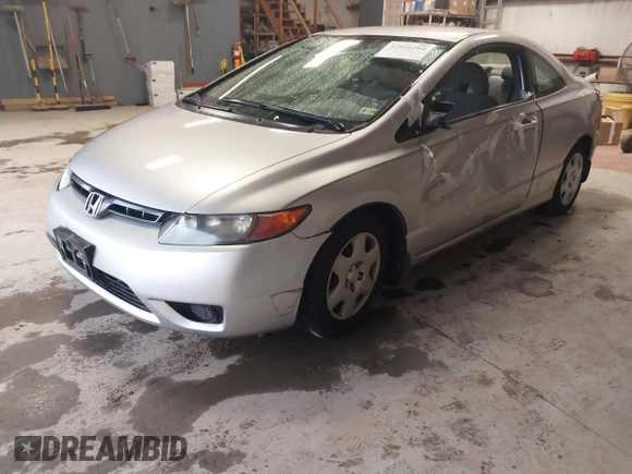 2006 Honda Civic Cpe LX with VIN 2HGFG126X6H532696, listed as a IAAI auction lot 42016264 with 209,509 mi miles. Bid and sale history available at carsss.com. Image 18.