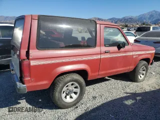 1988 Ford Bronco с VIN 1FMCU12T0JUD60132, выставлен на аукционе Copart как лот 81643864 с пробегом 9 594 миль миль и Чистый • Clean title. История ставок и продаж доступна на DreamBid. Изображение 3.