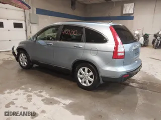 2009 Honda CR-V EX-L with VIN 5J6RE48739L037292, listed as a IAAI auction lot 41121290 with 150,597 mi miles. Bid and sale history available at carsss.com. Image 3.