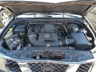 2006 Nissan Frontier Nismo z VIN 1N6AD06W06C449364, wystawiony jako Copart lot #66186774 z przebiegiem 320 070 mil mil oraz Szkoda całkowita • Salvage title. Historia ofert i sprzedaży dostępna na DreamBid. Obrazek 11.
