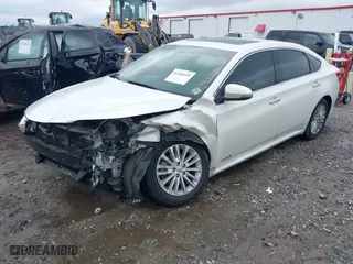 2014 Toyota Avalon Hybrid Limited with VIN 4T1BD1EB7EU019850, listed as a IAAI auction lot 41546595 with 202,509 mi miles. Bid and sale history available at carsss.com. Image 18.