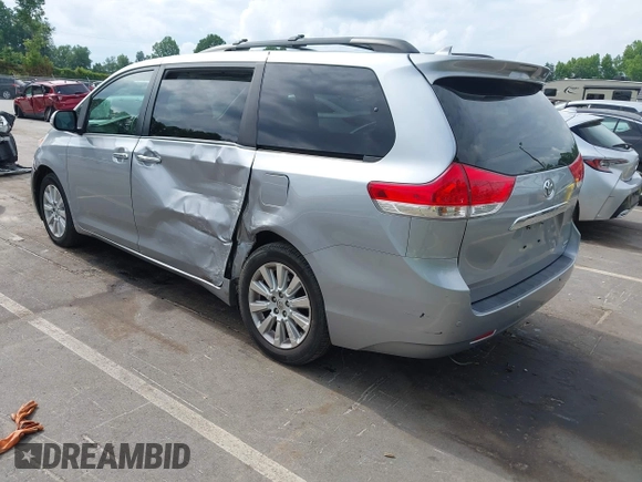 2013 Toyota Sienna XLE with VIN 5TDDK3DC3DS054803, listed as a IAAI auction lot 42389252 with 185,843 mi miles and . Bid and sale history available at DreamBid. Image 3.