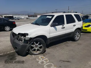 2006 Ford Escape XLS with VIN 1FMCU02Z36KA71926, listed as a Copart auction lot 57697364 with 225,212 mi miles and Salvage title. Bid and sale history available at DreamBid. Image 1.