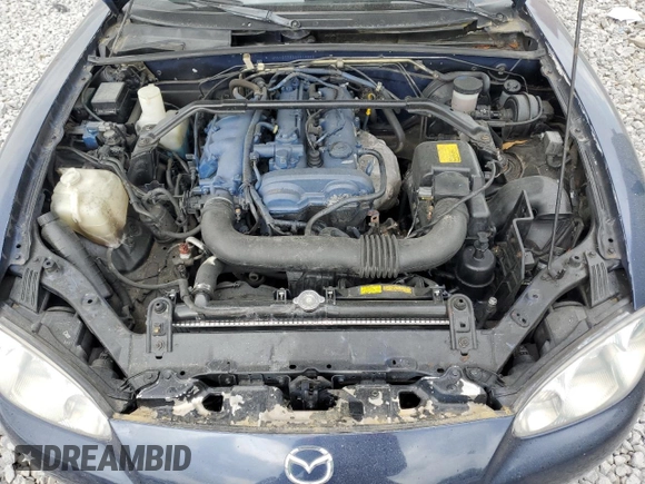 2003 Mazda MX-5 Miata Cloth with VIN JM1NB353230312023, listed as a Copart auction lot 53968875 with 174,252 mi miles and Salvage title. Bid and sale history available at DreamBid. Image 11.