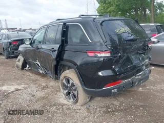 2022 Jeep Grand Cherokee with VIN 1C4RJYB69N8715243, listed as a IAAI auction lot 42319323 with 23,405 mi miles and . Bid and sale history available at DreamBid. Image 3.