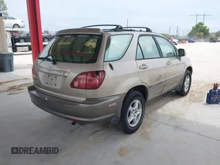 1999 Lexus RX 300 Luxury SUV with VIN JT6HF10U2X0018835, listed as a IAAI auction lot 41875166 with 134,861 mi miles. Bid and sale history available at carsss.com. Image 4.