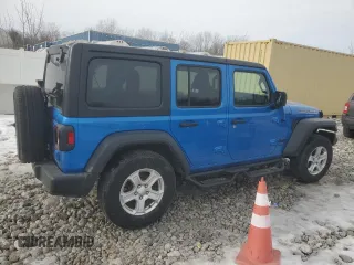2023 Jeep Wrangler Sport S with VIN 1C4HJXDN5PW573692, listed as a Copart auction lot 42982875 with 25,584 mi miles and Salvage Title. Bid and sale history available at DreamBid. Image 3.