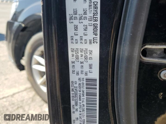 2013 Dodge Journey SXT with VIN 3C4PDDBG6DT639884, listed as a Copart auction lot 64623635 with 206,809 mi miles and Clean title. Bid and sale history available at DreamBid. Image 13.