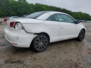2013 Volkswagen Eos Komfort with VIN WVWBW8AH0DV003581, listed as a Copart auction lot 54498655 with 95,203 mi miles and Salvage Title. Bid and sale history available at DreamBid. Image 3.