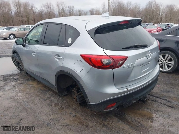 2016 Mazda CX-5 Grand Touring with VIN JM3KE4DY0G0816466, listed as a IAAI auction lot 41720059 with NaN miles. Bid and sale history available at carsss.com. Image 3.