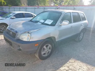 2003 Hyundai Santa Fe GLS z VIN KM8SC13E93U541750, wystawiony jako IAAI lot #42200817 z przebiegiem 174 842 mil mil oraz . Historia ofert i sprzedaży dostępna na DreamBid. Obrazek 2.