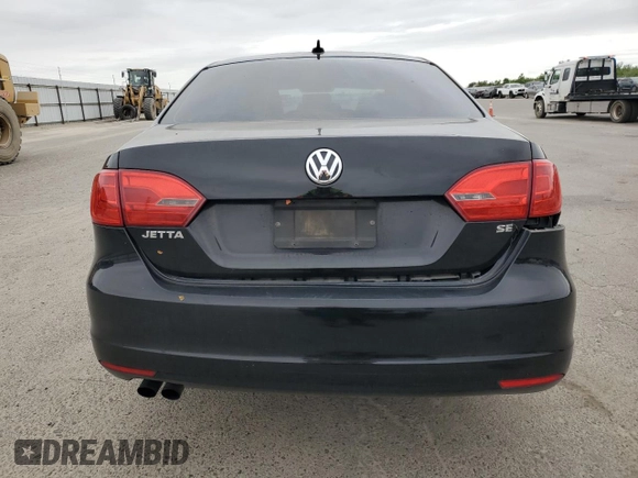 2014 Volkswagen Jetta SE with VIN 3VWD17AJ2EM381057, listed as a Copart auction lot 54267475 with 187,770 mi miles and Salvage title. Bid and sale history available at DreamBid. Image 6.