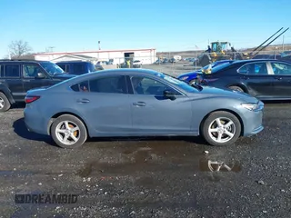 2021 Mazda 6 Carbon Edition with VIN JM1GL1WY3M1603064, listed as a IAAI auction lot 41199852 with 118,307 mi miles and . Bid and sale history available at DreamBid. Image 13.