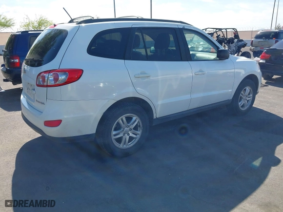 2010 Hyundai Santa Fe GLS with VIN 5NMSG3AB6AH339417, listed as a IAAI auction lot 42022856 with 166,850 mi miles. Bid and sale history available at carsss.com. Image 4.