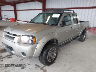 2003 Nissan Frontier SE z VIN 1N6ED29X73C438326, wystawiony jako IAAI lot #41437797 z przebiegiem 309 235 mil mil oraz . Historia ofert i sprzedaży dostępna na DreamBid. Obrazek 2.