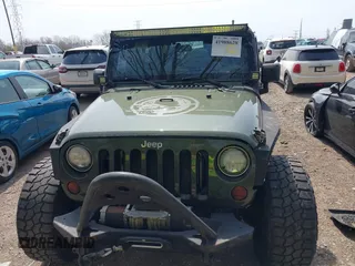2007 Jeep Wrangler Unlimited X with VIN 1J4GA39147L101084, listed as a IAAI auction lot 41988628 with 194,562 mi miles and . Bid and sale history available at DreamBid. Image 6.