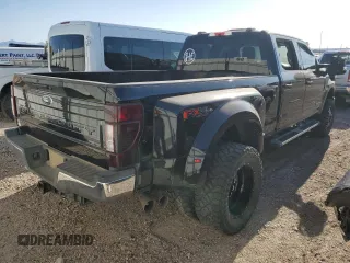 2022 Ford F-350 XL with VIN 1FT8W3DT9NEC09111, listed as a Copart auction lot 52178455 with 128,690 mi miles and Salvage title. Bid and sale history available at DreamBid. Image 3.