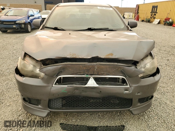 2011 Mitsubishi Lancer GTS with VIN JA32U8FW2BU005251, listed as a Copart auction lot 70879824 with 124,317 mi miles and Salvage Title. Bid and sale history available at carsss.com. Image 5.
