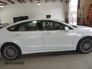 2014 Ford Fusion SE with VIN 3FA6P0HD8ER372731, listed as a IAAI auction lot 39915643 with 136,635 mi miles and . Bid and sale history available at DreamBid. Image 13.