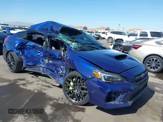 2019 Subaru WRX STI with VIN JF1VA2S63K9811084, listed as a IAAI auction lot 42129347 with 64,229 mi miles and . Bid and sale history available at DreamBid. Image 1.