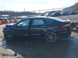 2014 Ford Fusion Titanium with VIN 3FA6P0K9XER119642, listed as a IAAI auction lot 41791340 with 150,777 mi miles. Bid and sale history available at carsss.com. Image 14.