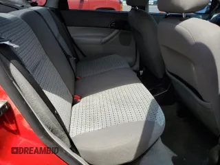 2007 Ford Focus S z VIN 1FAFP34NX7W360015, wystawiony jako Copart lot #57499655 z przebiegiem 237 516 mil mil oraz Szkoda całkowita • Salvage title. Historia ofert i sprzedaży dostępna na DreamBid. Obrazek 10.
