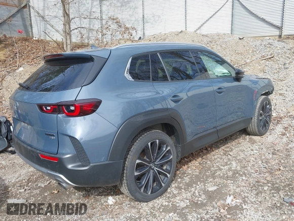 2023 Mazda CX-50 2.5 Turbo Premium Plus Package with VIN 7MMVABEY1PN101123, listed as a IAAI auction lot 41858602 with 34,541 mi miles. Bid and sale history available at carsss.com. Image 4.