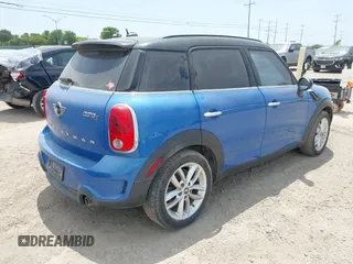 2014 MINI Countryman S with VIN WMWZC3C52EWP28069, listed as a IAAI auction lot 42026583 with 137,342 mi miles and . Bid and sale history available at DreamBid. Image 4.