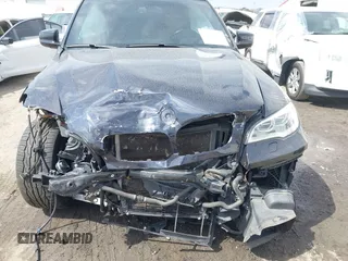 2013 BMW X5 M z VIN 5YMGY0C59DLL15891, wystawiony jako IAAI lot #41851131 z przebiegiem 96 184 mil mil oraz . Historia ofert i sprzedaży dostępna na DreamBid. Obrazek 13.