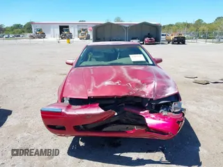 2002 Cadillac Eldorado ESC z VIN 1G6EL12Y72B102153, wystawiony jako IAAI lot #41861541 z przebiegiem 91 273 mil mil oraz . Historia ofert i sprzedaży dostępna na DreamBid. Obrazek 12.