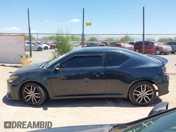 2015 Scion tC z VIN JTKJF5C74FJ003875, wystawiony jako IAAI lot #42184426 z przebiegiem 81 248 mil mil oraz . Historia ofert i sprzedaży dostępna na DreamBid. Obrazek 14.