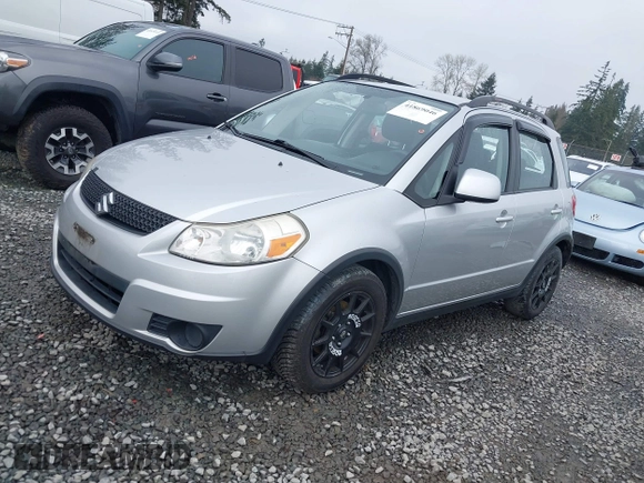 2010 Suzuki SX4 z VIN JS2YB5A3XA6300216, wystawiony jako IAAI lot #41869046 z przebiegiem 129 709 mil mil oraz . Historia ofert i sprzedaży dostępna na DreamBid. Obrazek 2.