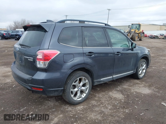 2017 Subaru Forester Touring with VIN JF2SJATC5HH518783, listed as a IAAI auction lot 41889172 with 115,801 mi miles and . Bid and sale history available at DreamBid. Image 4.