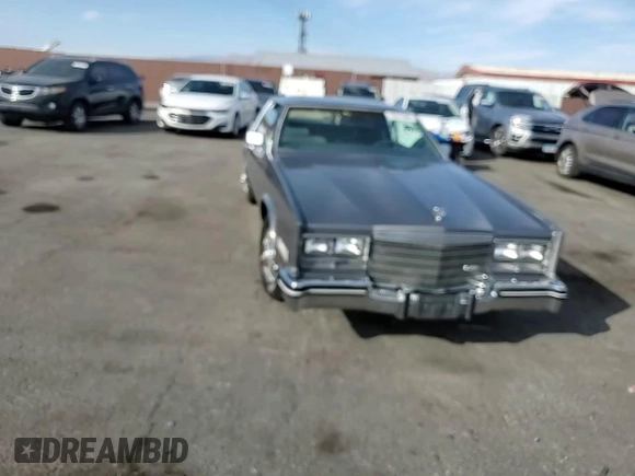 1985 Cadillac Eldorado z VIN 1G6EL5786FE628861, wystawiony jako Copart lot #76372384 z przebiegiem 15 146 mil mil oraz Szkody całkowita. Historia ofert i sprzedaży dostępna na DreamBid. Obrazek 10.