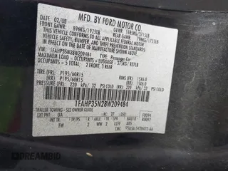 2008 Ford Focus SE with VIN 1FAHP35N28W209484, listed as a IAAI auction lot 41892438 with 311,456 mi miles. Bid and sale history available at carsss.com. Image 9.