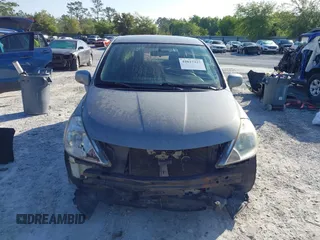 2012 Nissan Versa S with VIN 3N1BC1CP8CK242212, listed as a IAAI auction lot 42027327 with 117,118 mi miles. Bid and sale history available at carsss.com. Image 12.