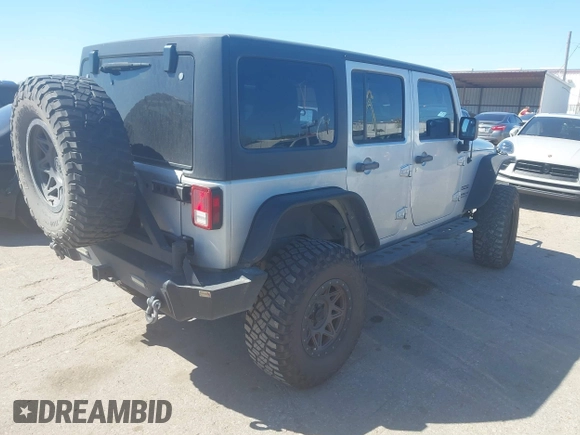 2012 Jeep Wrangler Unlimited Sport with VIN 1C4BJWDG8CL270788, listed as a IAAI auction lot 41758929 with 138,935 mi miles. Bid and sale history available at carsss.com. Image 4.