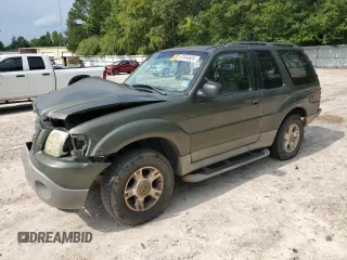 2003 Ford Explorer Sport XLS z VIN 1FMYU60E03UC12105, wystawiony jako Copart lot #67044604 z przebiegiem 277 642 mil mil oraz Szkody całkowita. Historia ofert i sprzedaży dostępna na DreamBid. Obrazek 1.