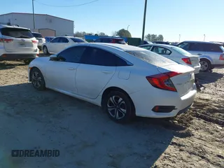 2017 Honda Civic LX z VIN 19XFC2F50HE007646, wystawiony jako IAAI lot #41360121 z przebiegiem 133 800 mil mil oraz . Historia ofert i sprzedaży dostępna na DreamBid. Obrazek 3.