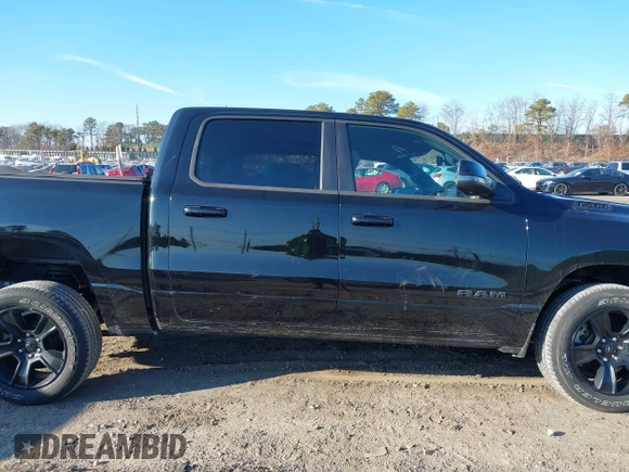 2023 Ram 1500 Big Horn with VIN 1C6SRFFT1PN660751, listed as a IAAI auction lot 41692496 with 30,215 mi miles and . Bid and sale history available at DreamBid. Image 14.