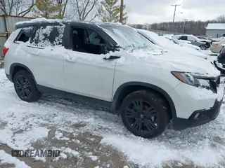 2021 Honda Passport Sport with VIN 5FNYF8H29MB009406, listed as a IAAI auction lot 41246817 with 71,997 mi miles and . Bid and sale history available at DreamBid. Image 1.