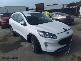2021 Ford Escape SEL with VIN 1FMCU9H97MUA92923, listed as a IAAI auction lot 34032377 with 9,128 mi miles. Bid and sale history available at carsss.com. Image 1.