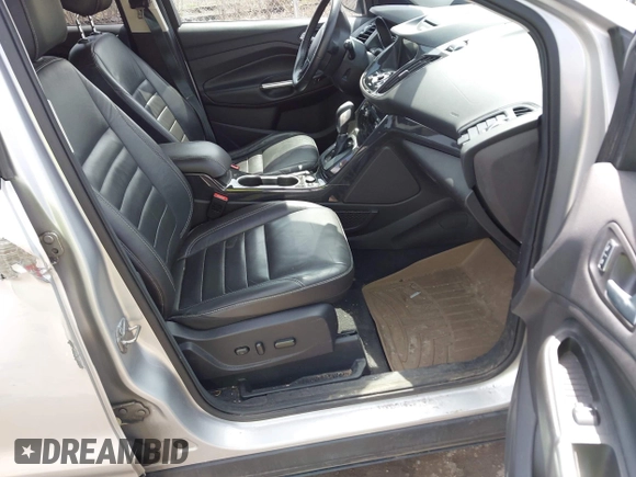 2016 Ford Escape Titanium with VIN 1FMCU9JX3GUA62802, listed as a IAAI auction lot 42001690 with 124,452 mi miles. Bid and sale history available at carsss.com. Image 5.