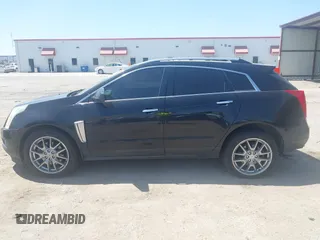 2013 Cadillac SRX Premium Collection with VIN 3GYFNJE33DS560639, listed as a IAAI auction lot 42015863 with 161,270 mi miles and . Bid and sale history available at DreamBid. Image 14.