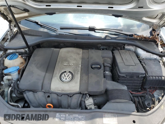 2009 Volkswagen Rabbit S с VIN WVWBA71KX9W048212, выставлен на аукционе Copart как лот 60592825 с пробегом 141 893 миль миль и Списание • Salvage title. История ставок и продаж доступна на DreamBid. Изображение 11.