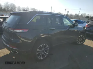2023 Jeep Grand Cherokee Overland with VIN 1C4RJHDG4P8847576, listed as a Copart auction lot 42959755 with 21,464 mi miles and Salvage title. Bid and sale history available at DreamBid. Image 3.