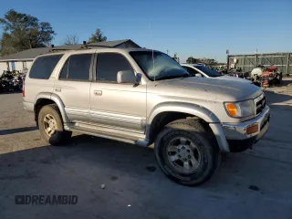 1999 Toyota 4Runner Limited with VIN JT3HN87R0X9024378, listed as a Copart auction lot 76632964 with 302,392 mi miles and Clean title. Bid and sale history available at DreamBid. Image 4.