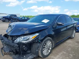 2014 Toyota Avalon Limited z VIN 4T1BD1EB8EU030288, wystawiony jako IAAI lot #42259957 z przebiegiem 162 850 mil mil oraz . Historia ofert i sprzedaży dostępna na DreamBid. Obrazek 2.