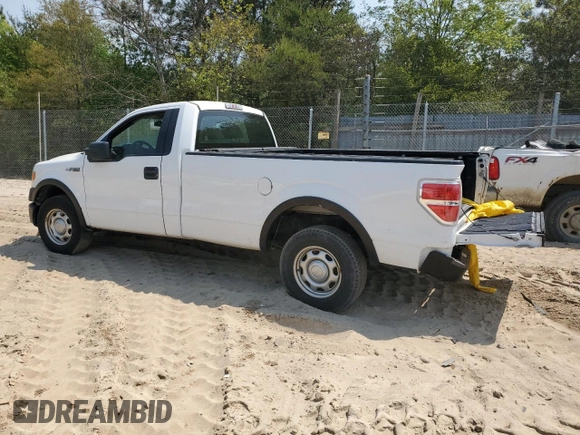 2013 Ford F-150 XL with VIN 1FTMF1CM8DKE67276, listed as a Copart auction lot 52690085 with 149,034 mi miles and Salvage title. Bid and sale history available at DreamBid. Image 2.