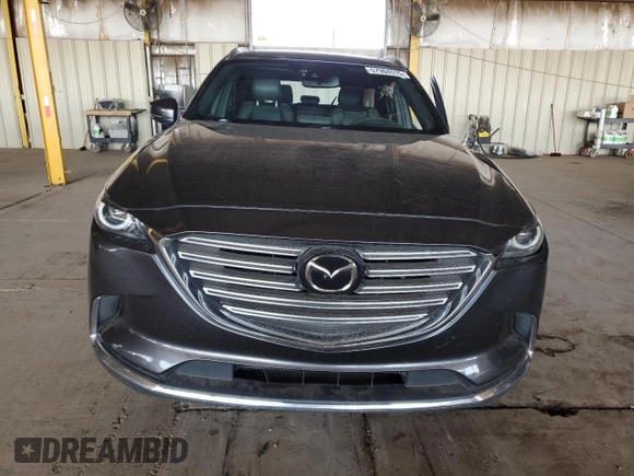 2016 Mazda CX-9 Grand Touring с VIN JM3TCADY3G0119947, выставлен на аукционе Copart как лот 57904515 с пробегом 94 251 миль миль и Списание • Salvage title. История ставок и продаж доступна на DreamBid. Изображение 5.
